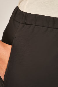 Close-up of black spa pants 